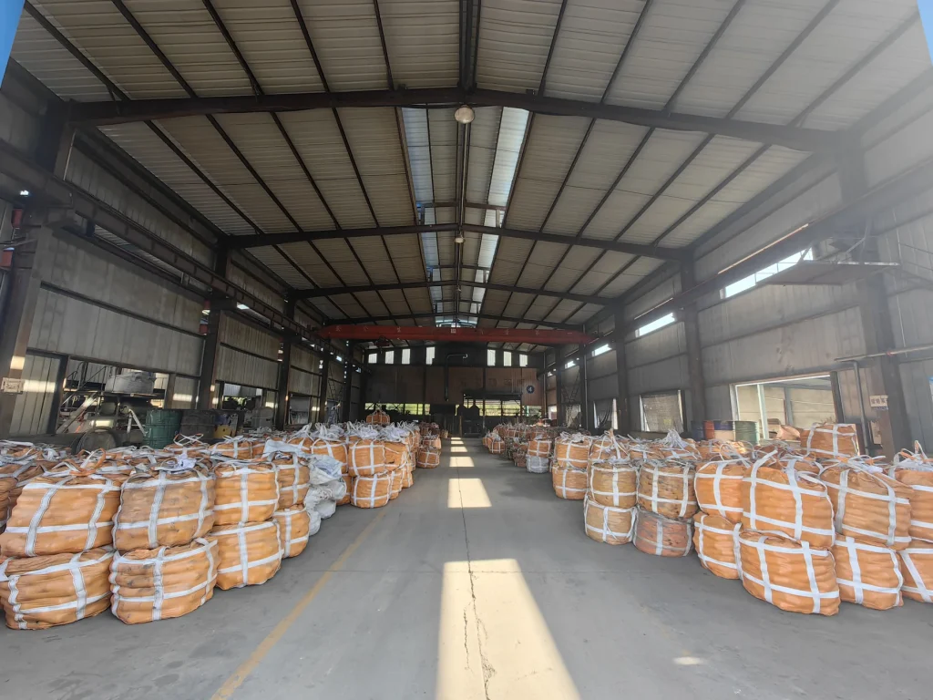 Finished grinding media packed in drums in the warehouse